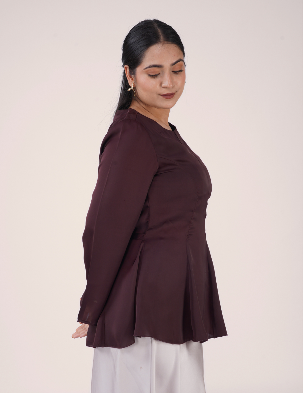 THE POISE PEPLUM TOP